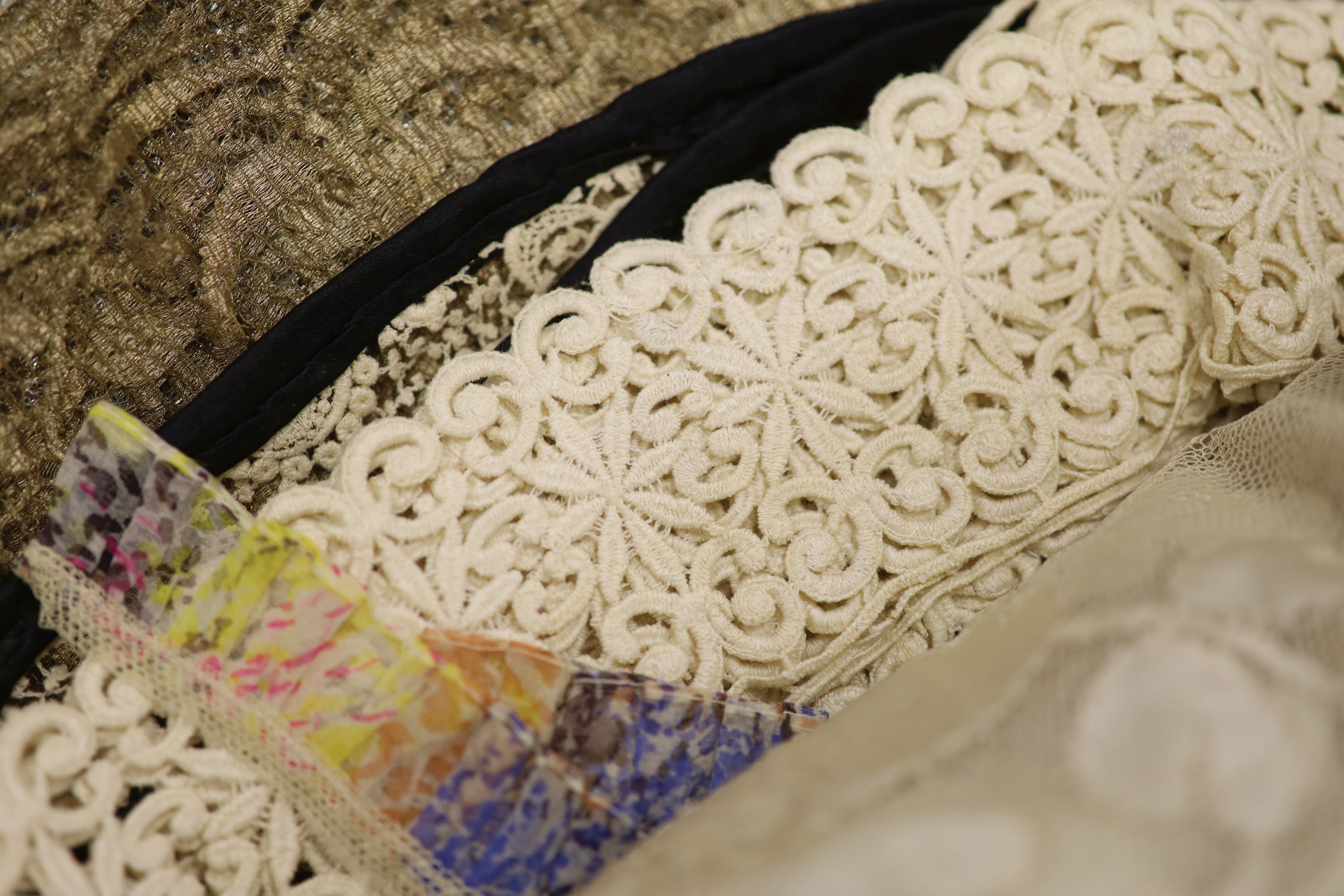 A silk lace stole, collar and Maltese collar, christening shawl, tape lace collar, a metallic gold and silver machine lace panel etc